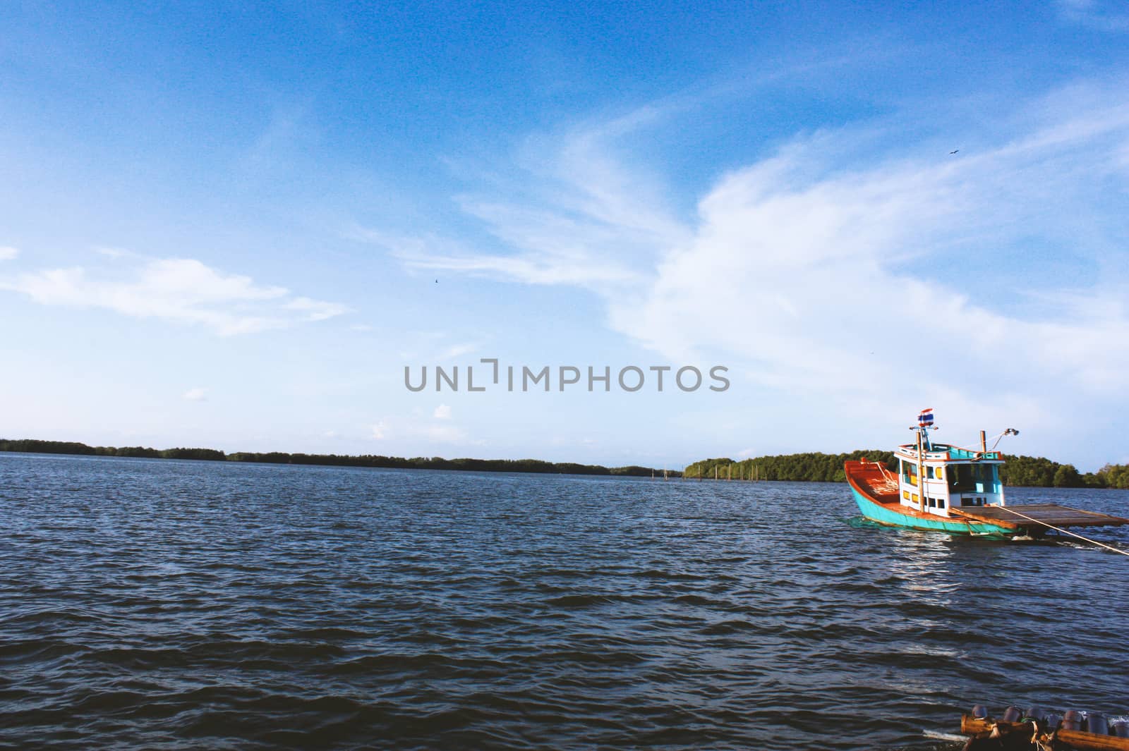 Boat on sea in cloudy sky day