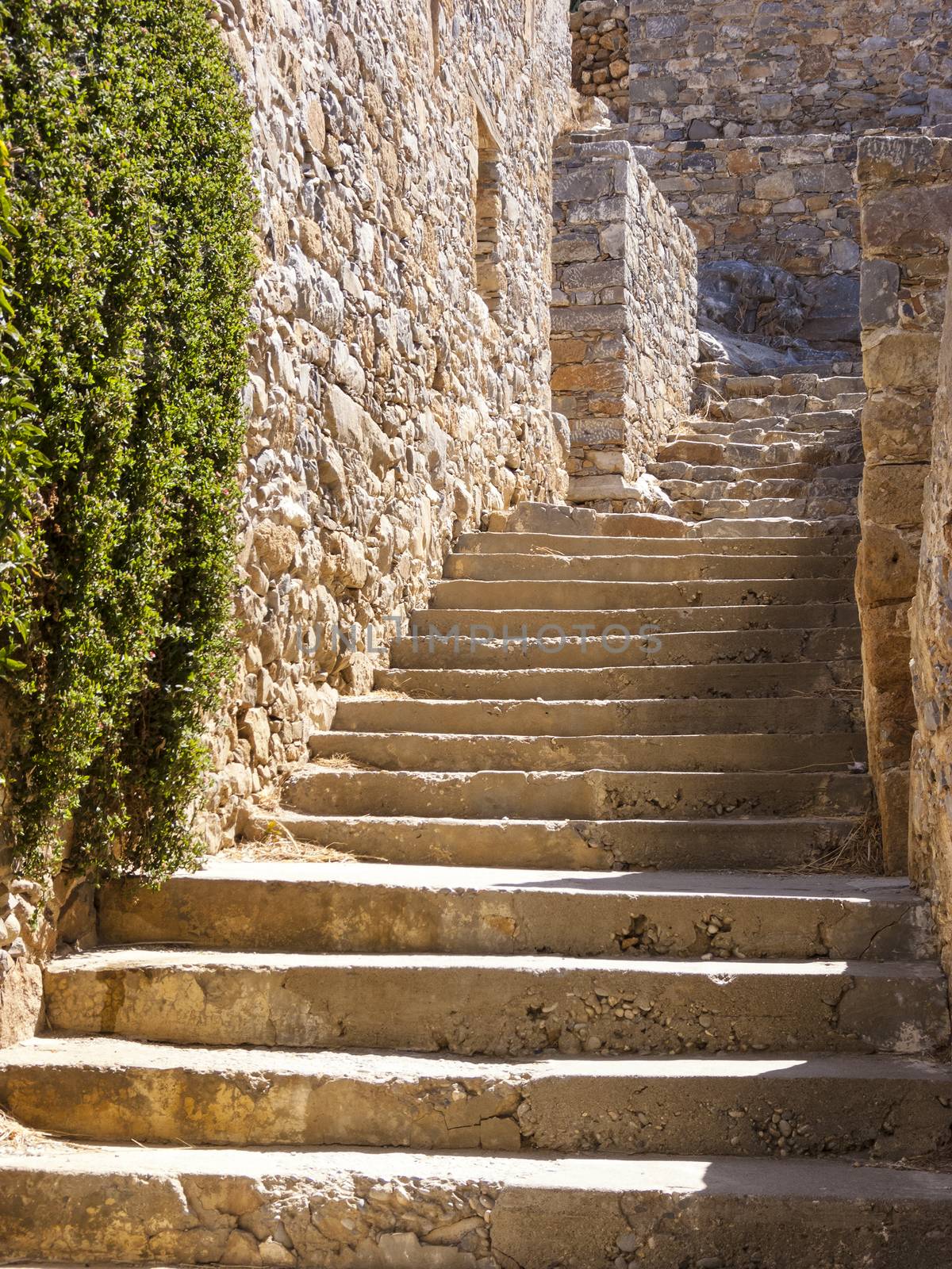 Stairs and walls in the Spinalonga island of Crete at Greece