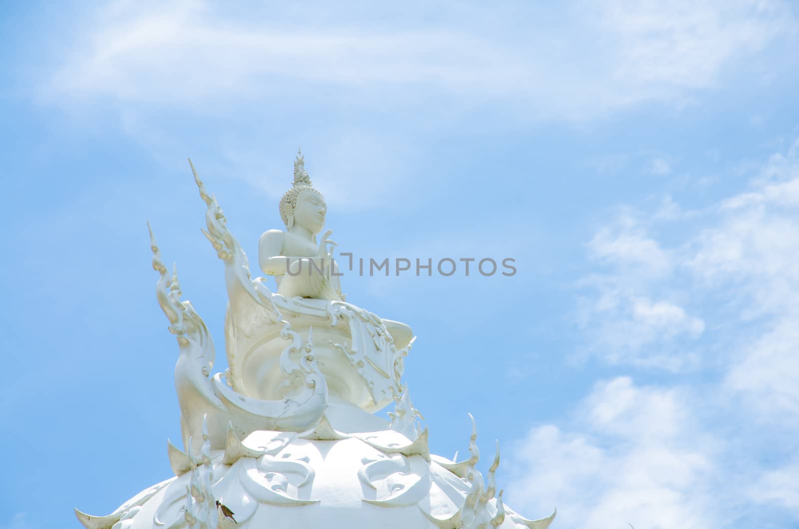White Buddha Statue Wat Rong Khun by migrean