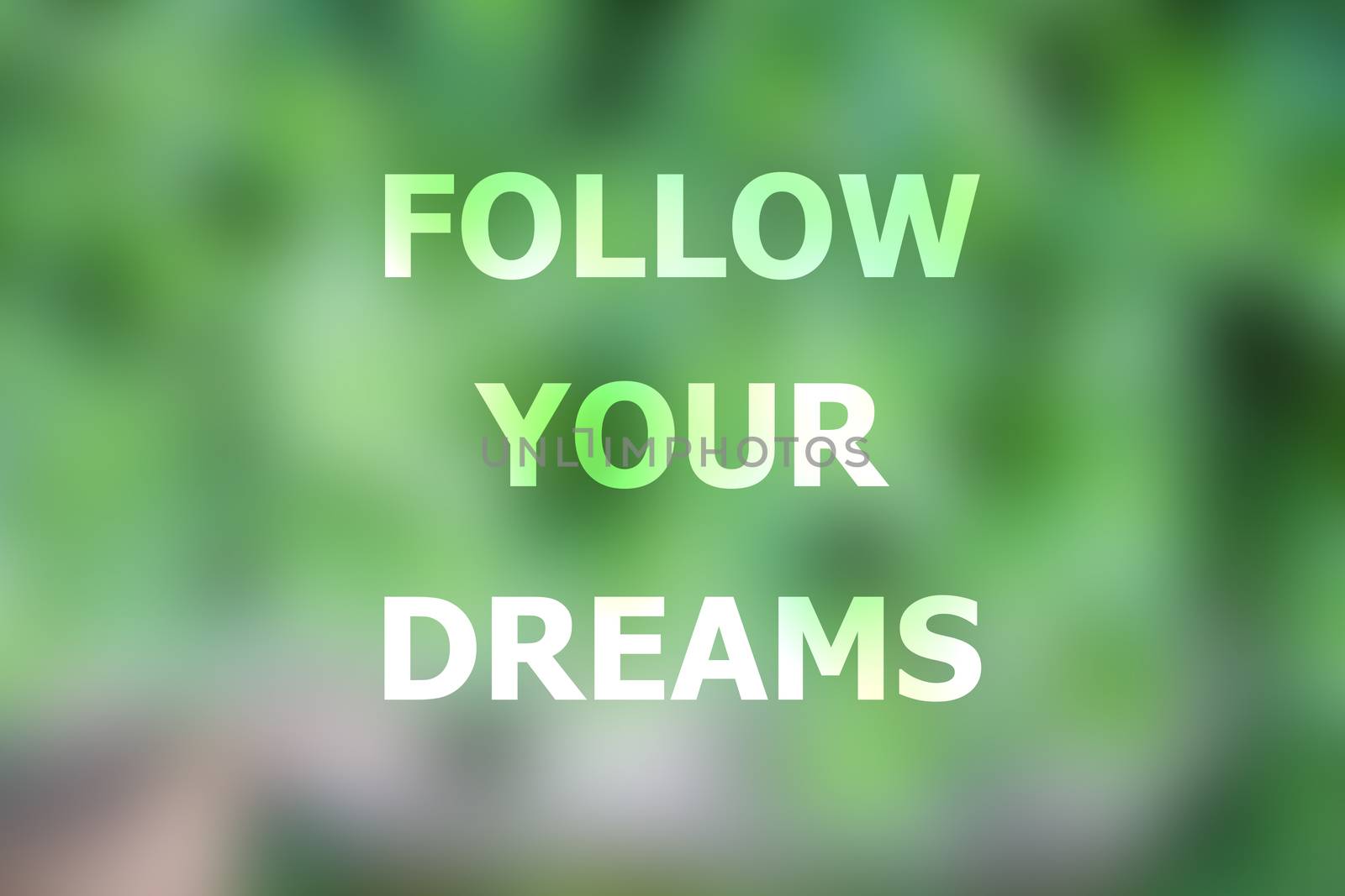 Follow your dreams inspirational quote on blurred background