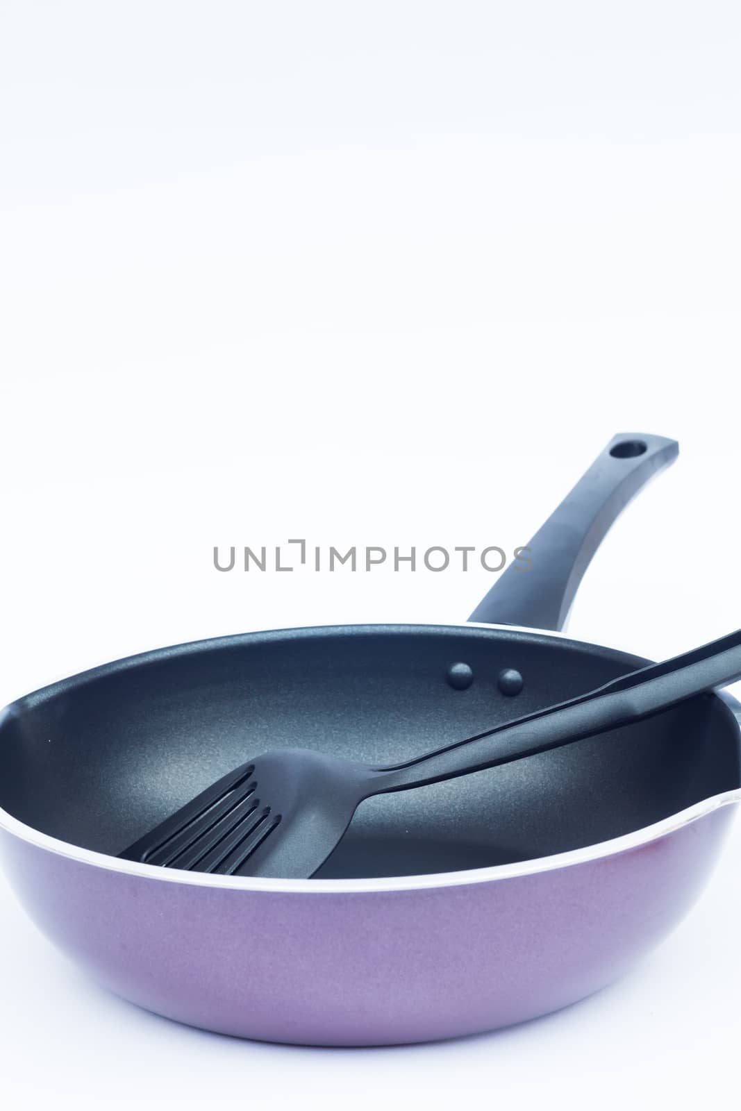 Non stick frying pan on white background by punsayaporn