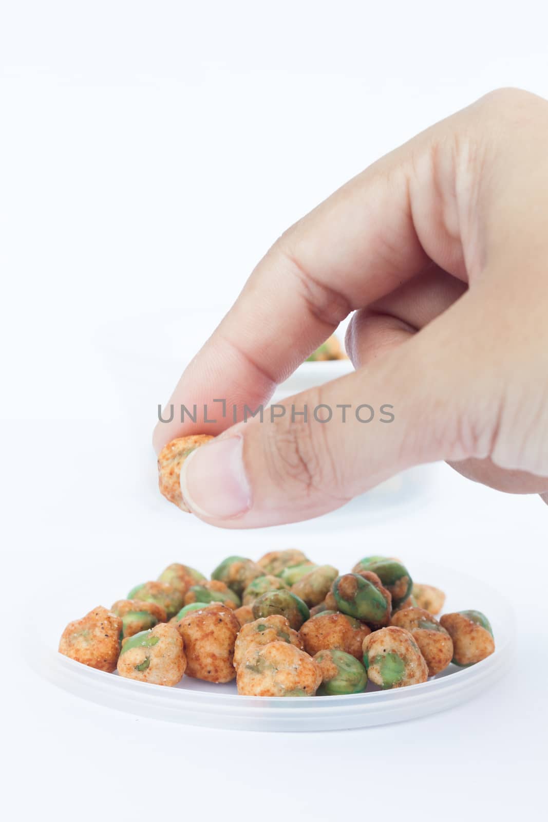 Dry spice peas on white background by punsayaporn