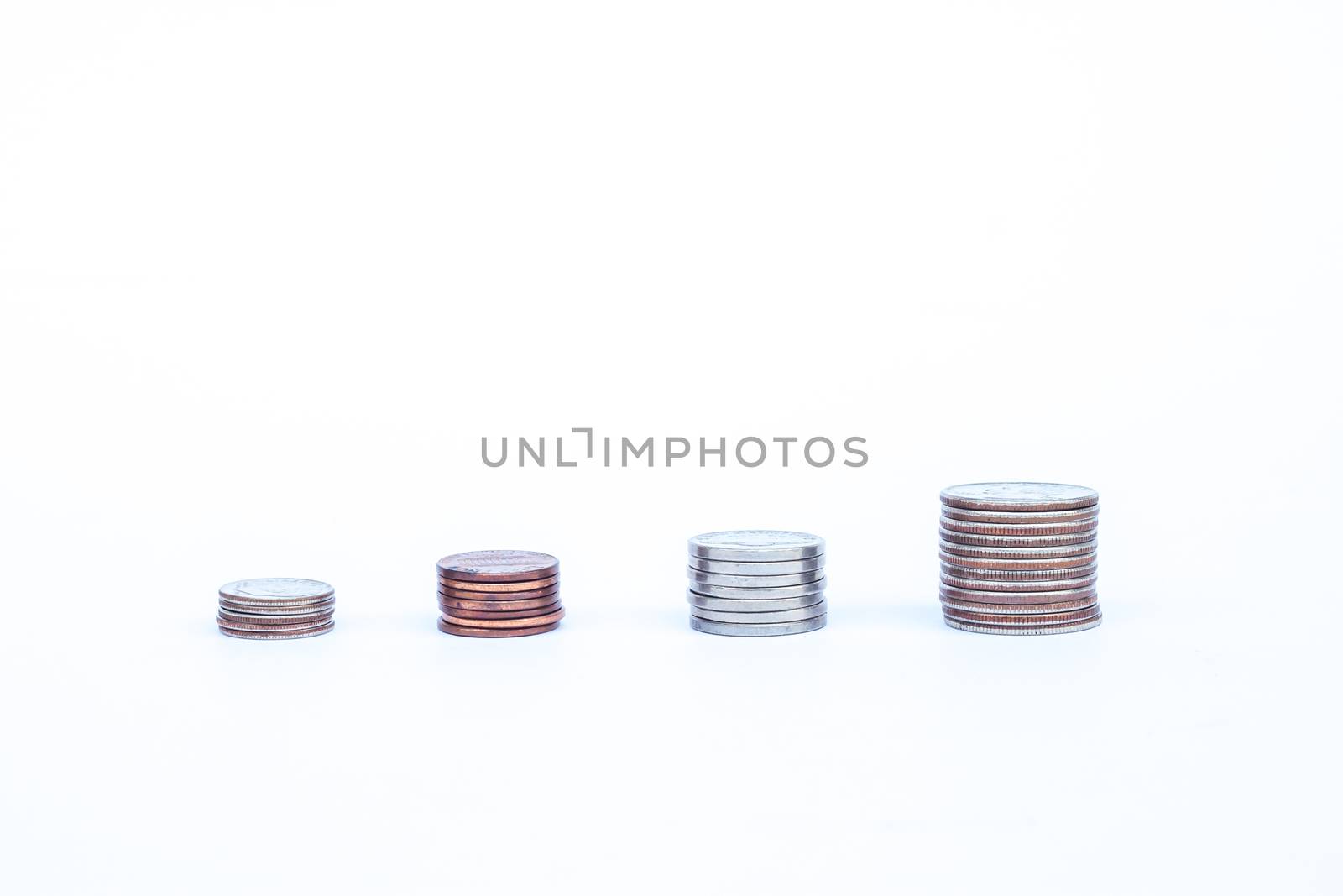 Money coin growing graph with white background, stock photo