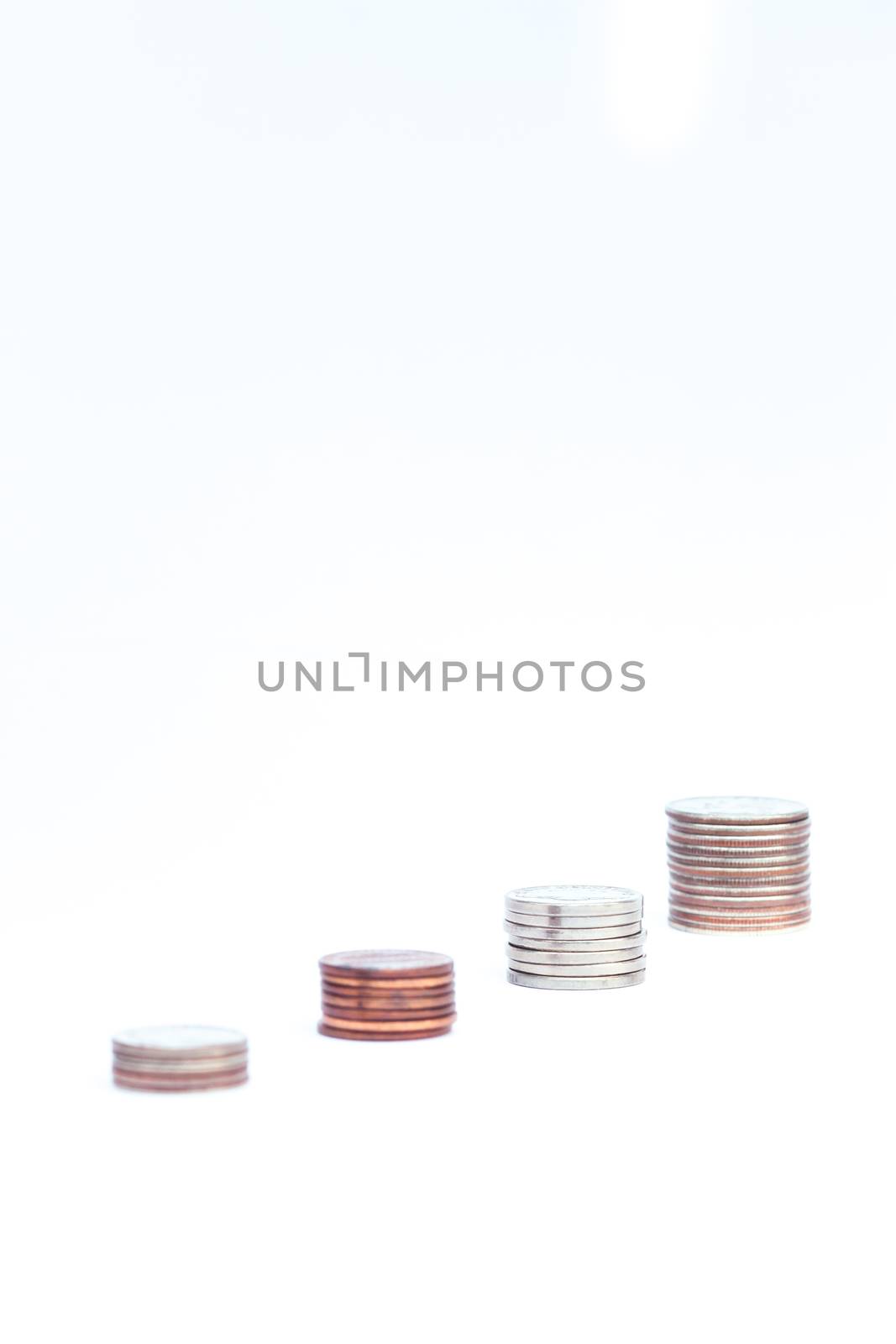 Money coin growing graph with white background, stock photo