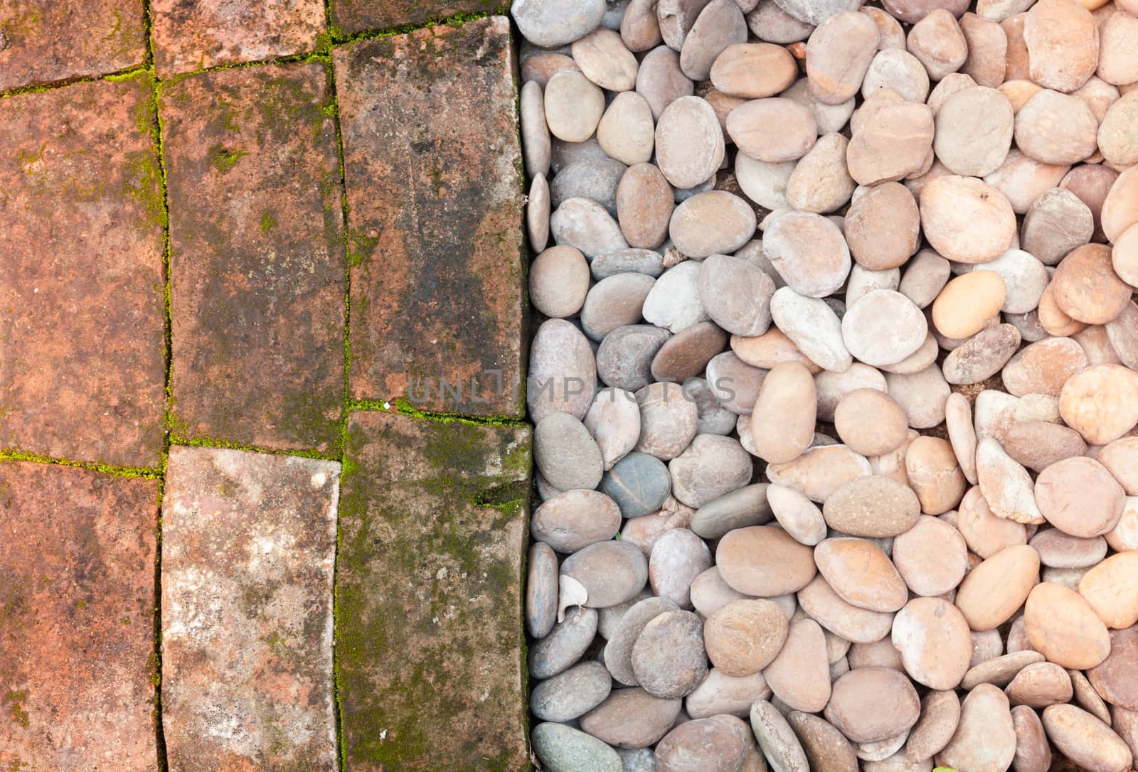 Pebble stones and bricks abstract background, stock photo