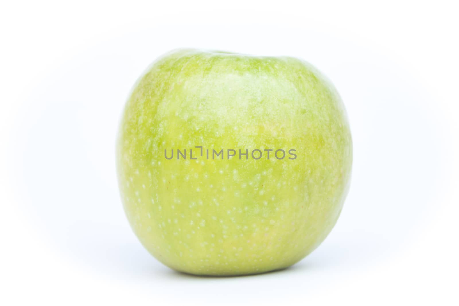 Green apple on white background, stock photo