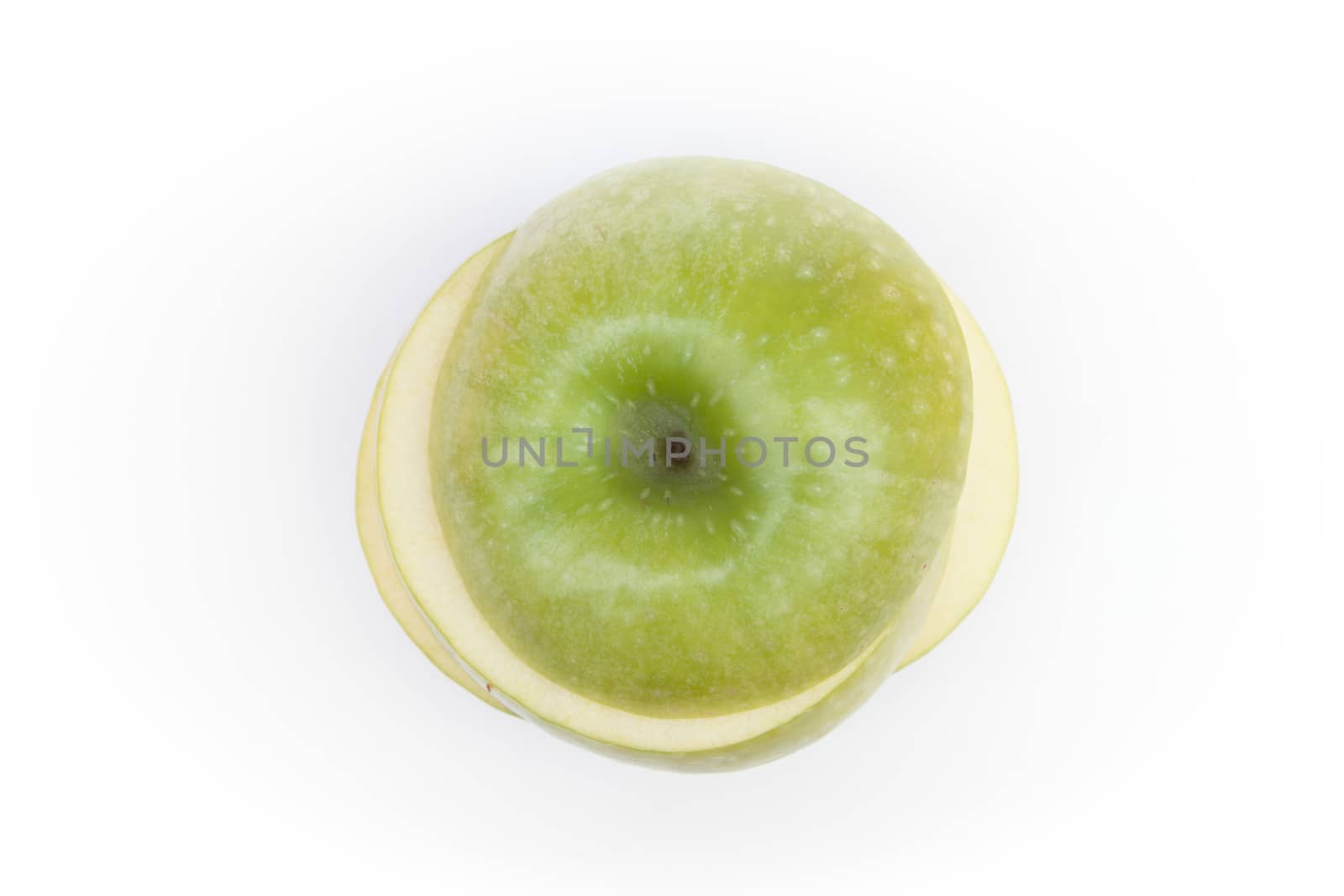 Sliced green apple on white background, stock photo