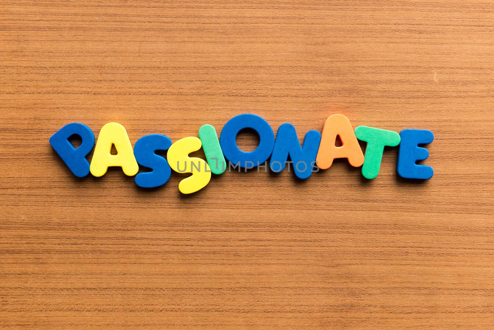 passionate colorful word on the wooden background