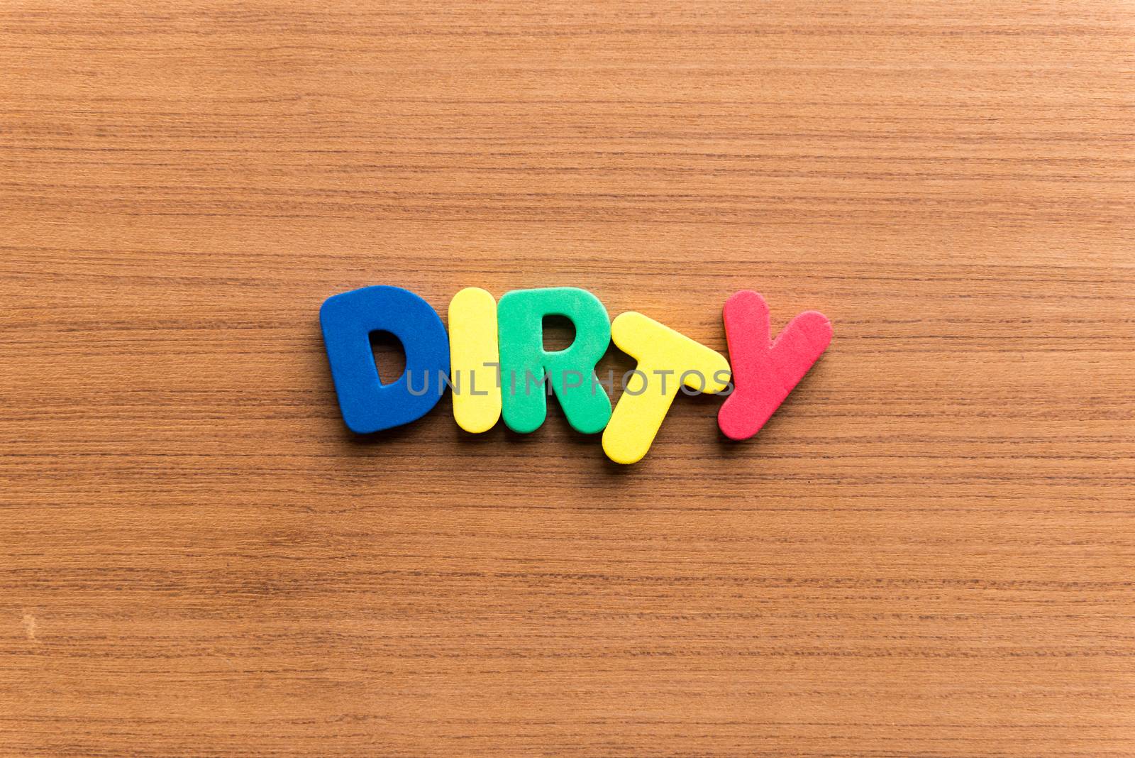 dirty colorful word on the wooden background