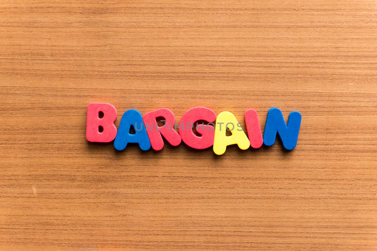 bargain colorful word on the wooden background