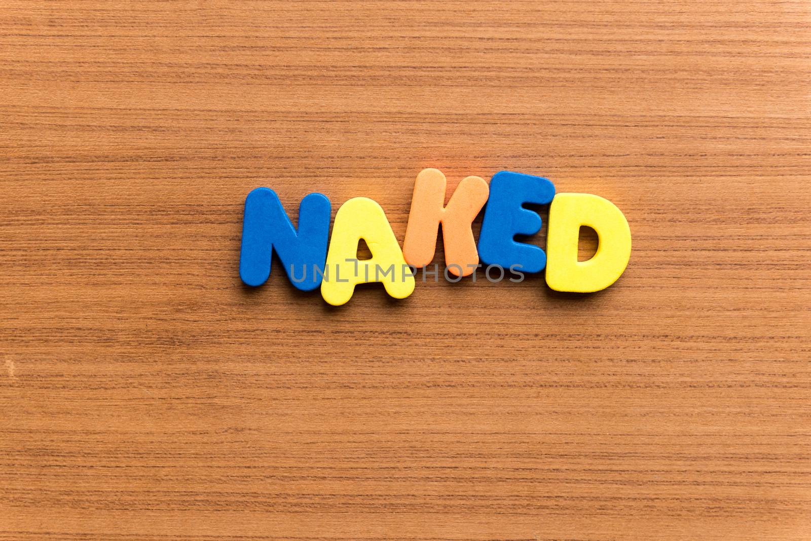 naked colorful word on the wooden background