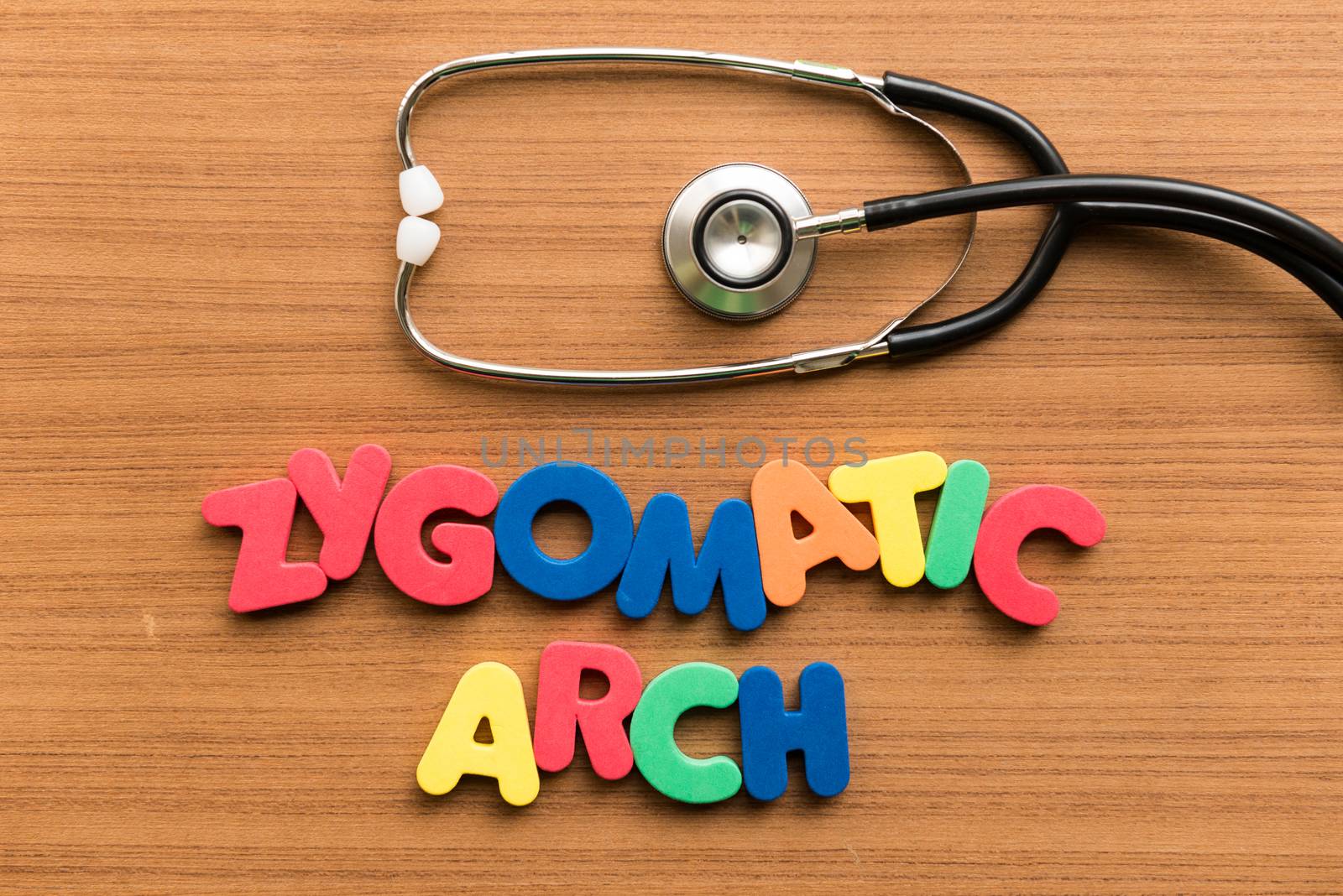 zygomatic arch colorful word with stethoscope on wooden background