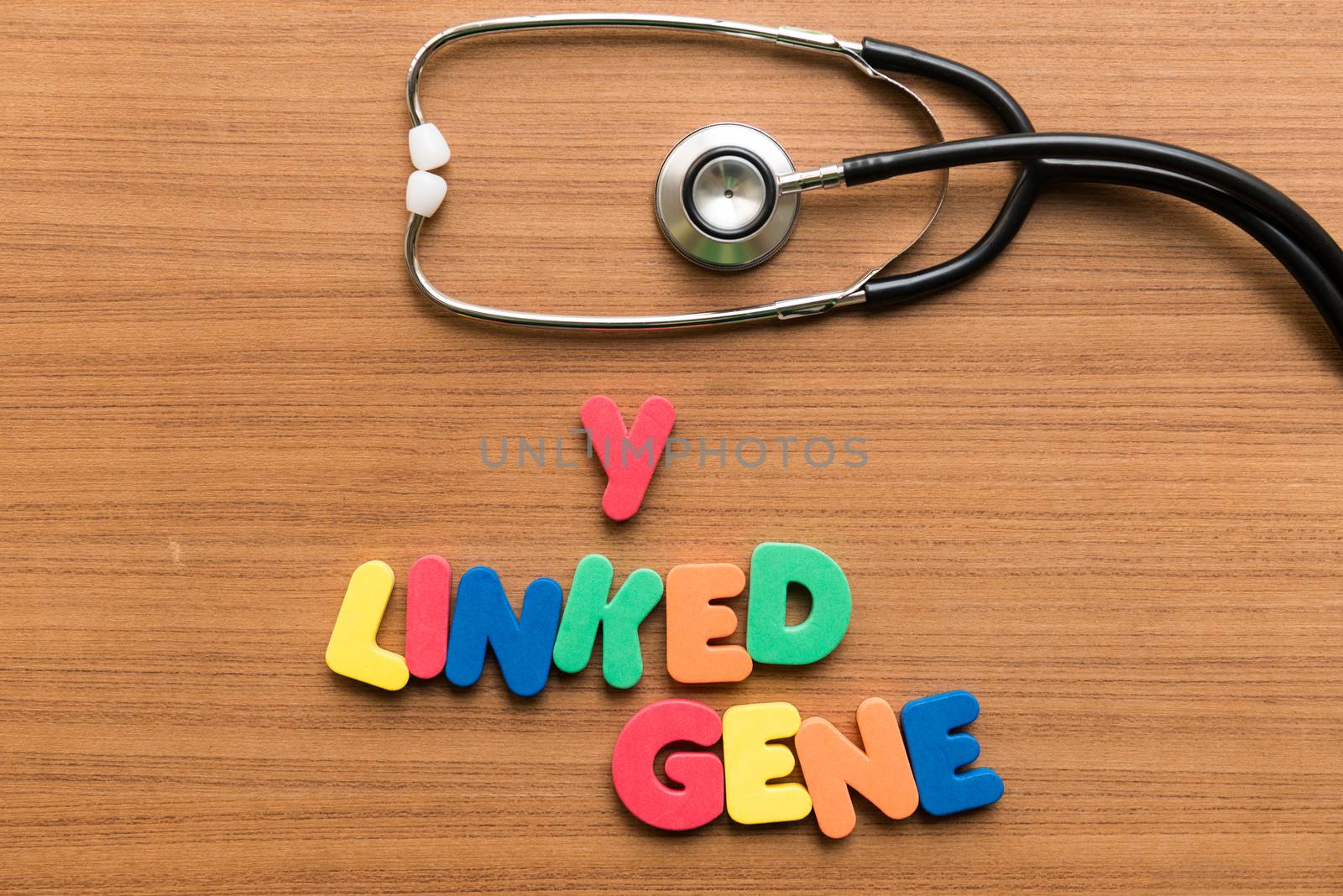 y linked gene colorful word with stethoscope on wooden background