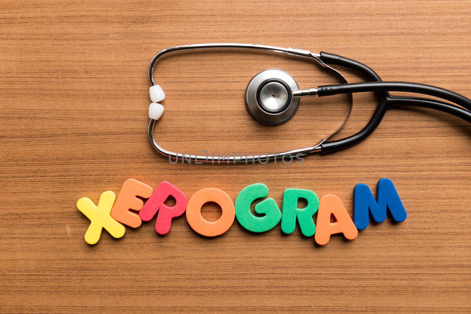 xerogram colorful word with stethoscope on wooden background