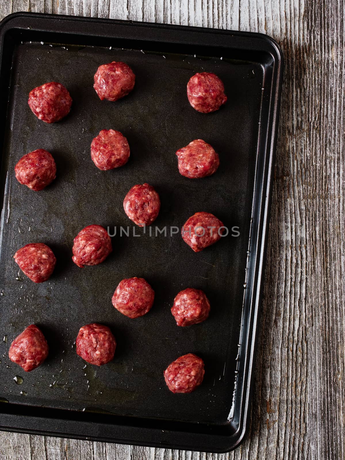 tray of uncooked meatball by zkruger