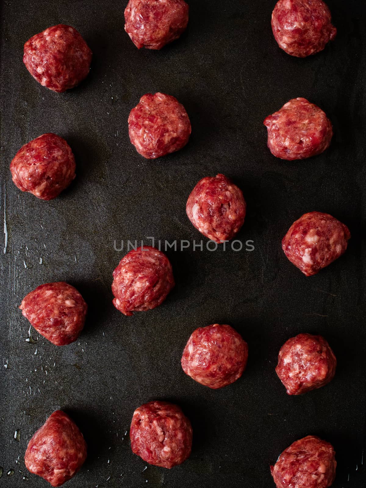 close up of tray  uncooked meatball