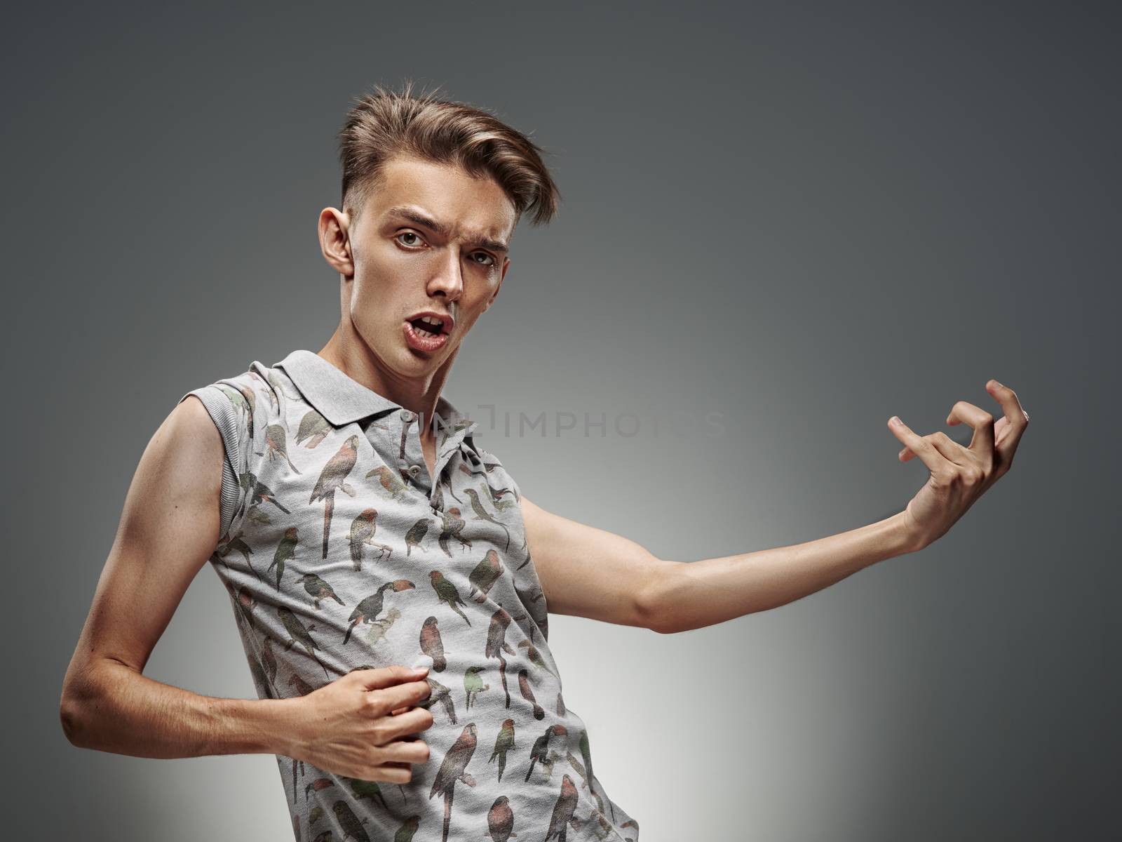 Emotional portrait of a teenager playing on air guitar by shivanetua