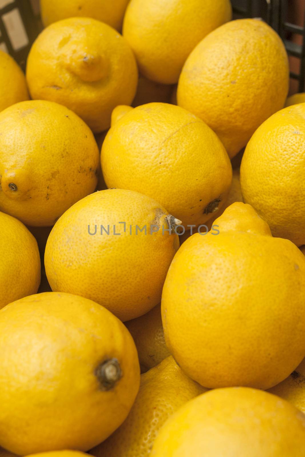 stack of fresh lemons by johnqsbf