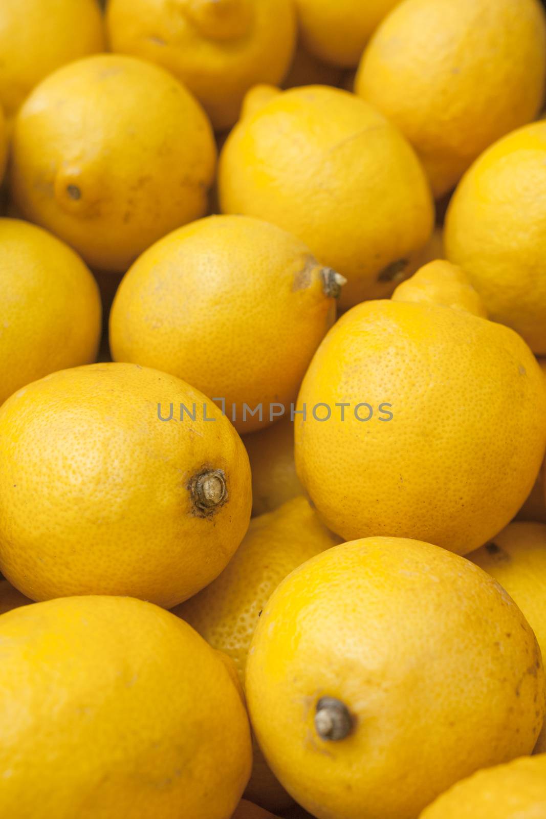 stack of fresh lemons by johnqsbf