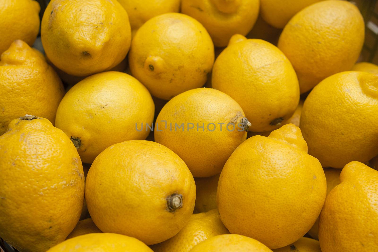 stack of fresh lemons by johnqsbf