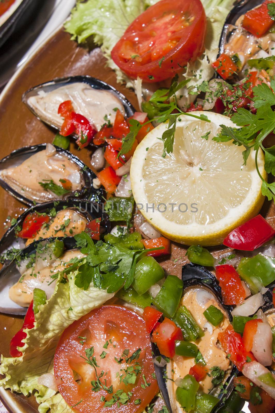 traditional spanish cuisine paella with mussels and vegetables