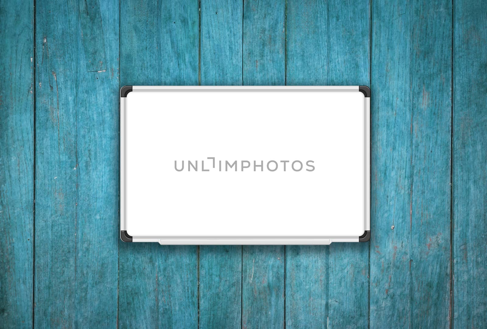 Blank white board on blue wooden texture background, stock photo