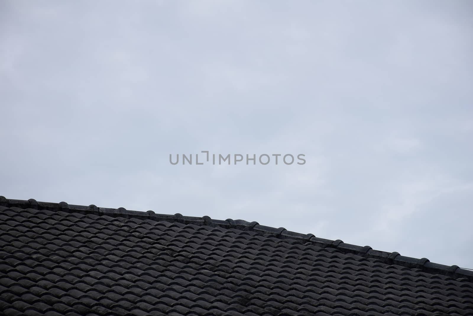 Close up roof texture with blue sky background.