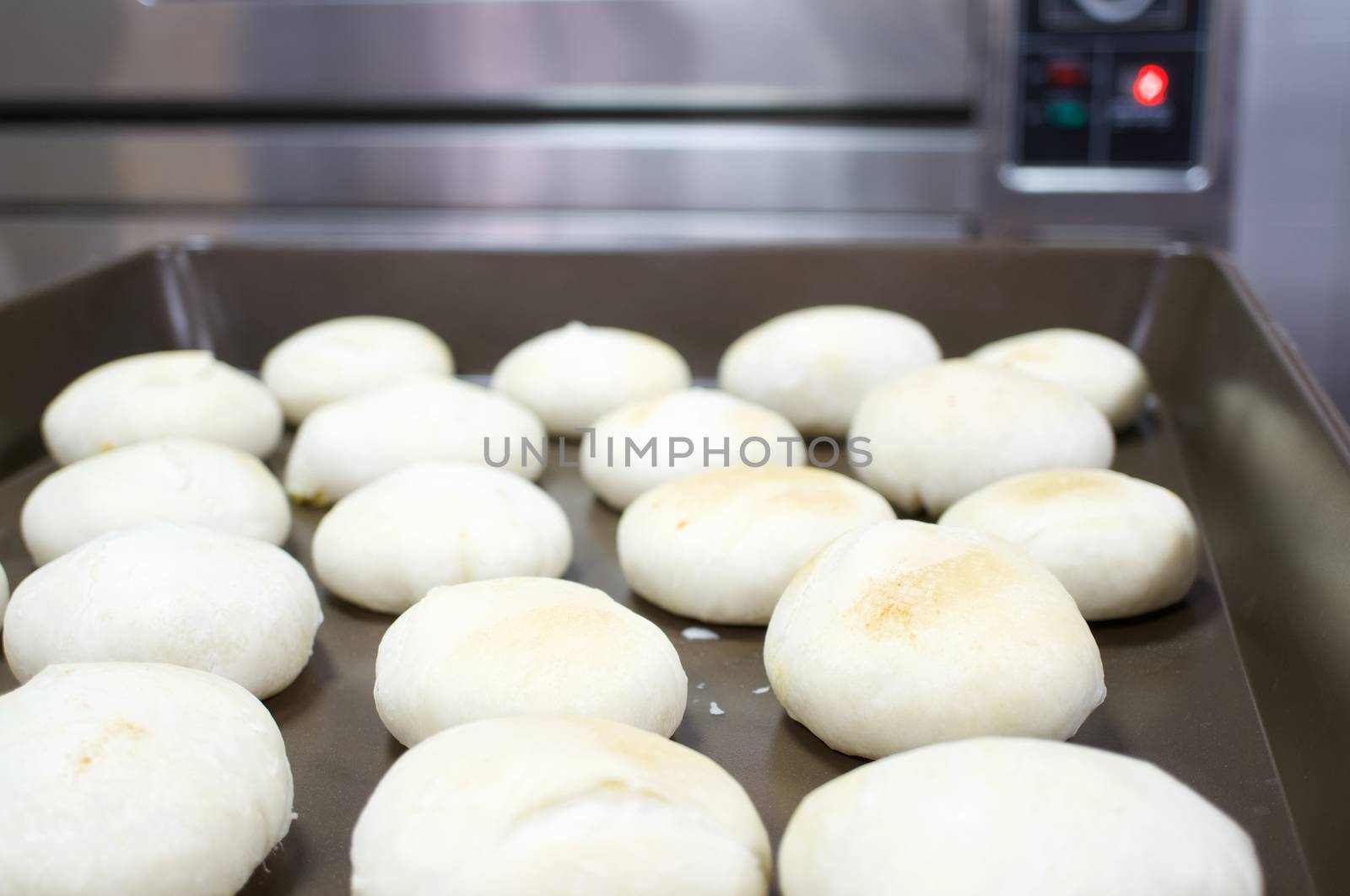 Chinese Pastry Mung Bean on tray have oven as background by eaglesky