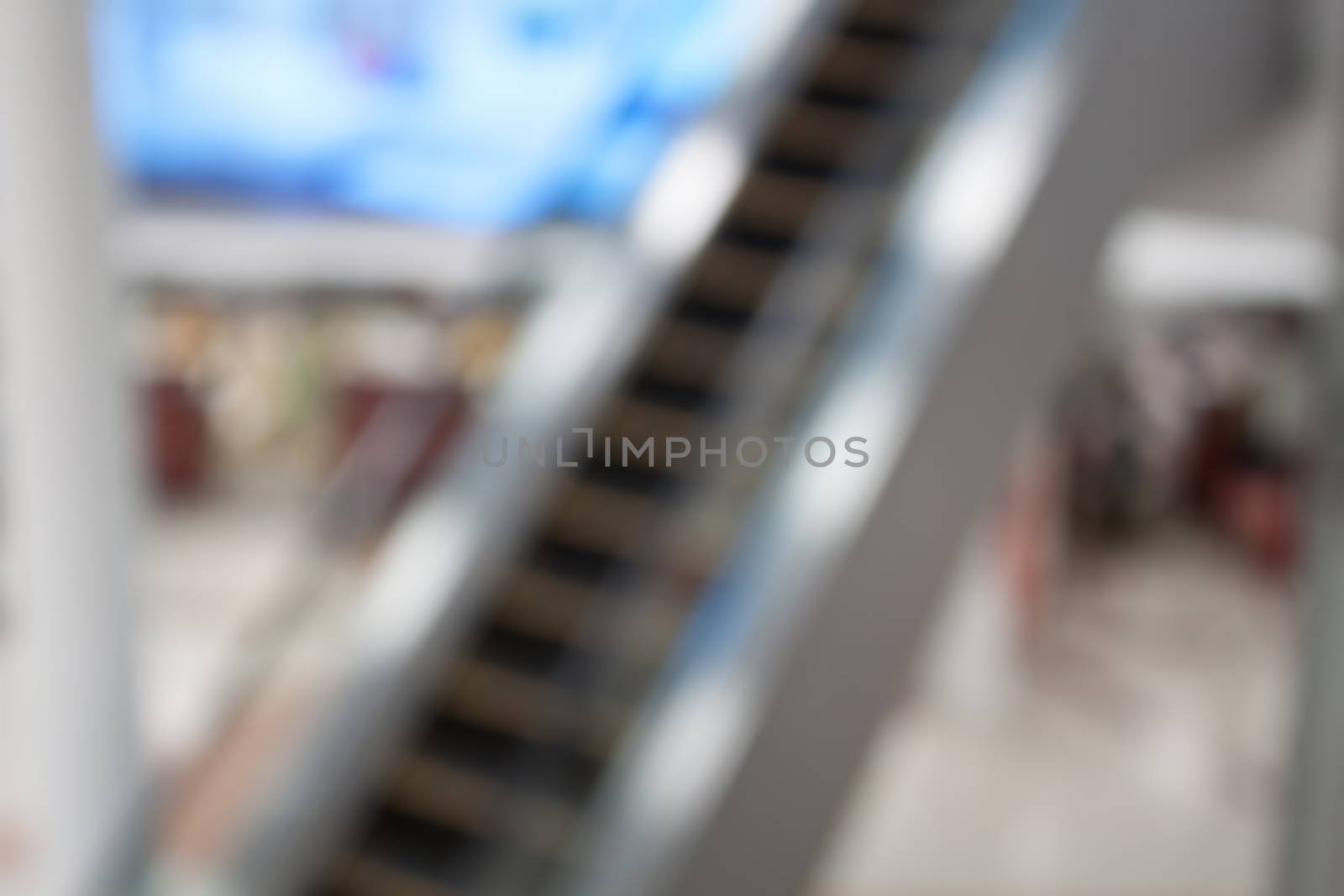 Abstract blurred background of escalator in Airport by punsayaporn