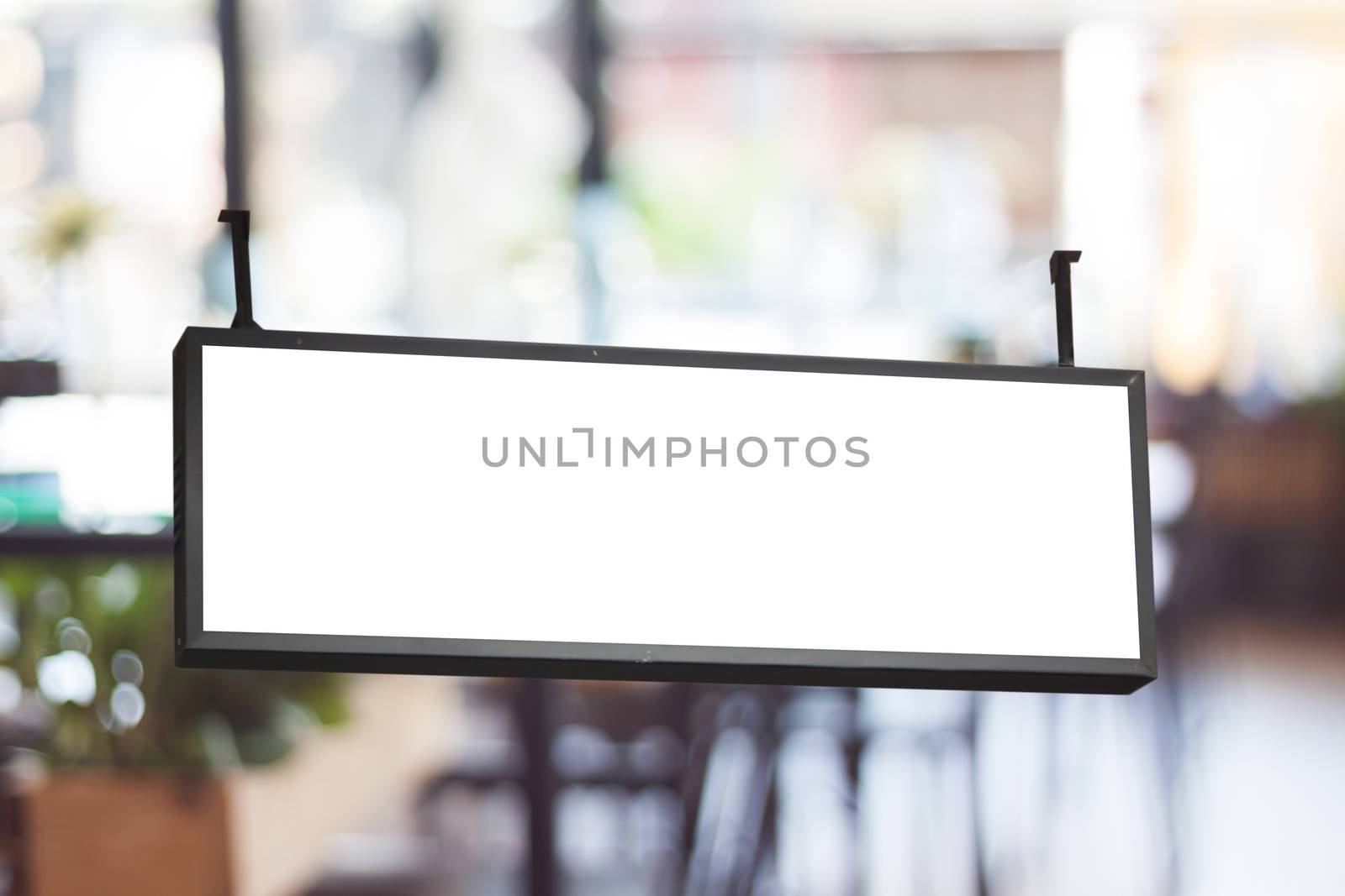 Blank signboard with blurred cafe background, stock photo