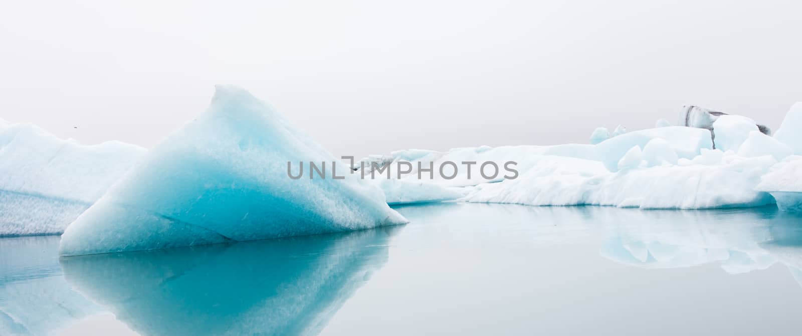 Jokulsarlon is a large glacial lake in southeast Iceland - Ice breaking of a glacier