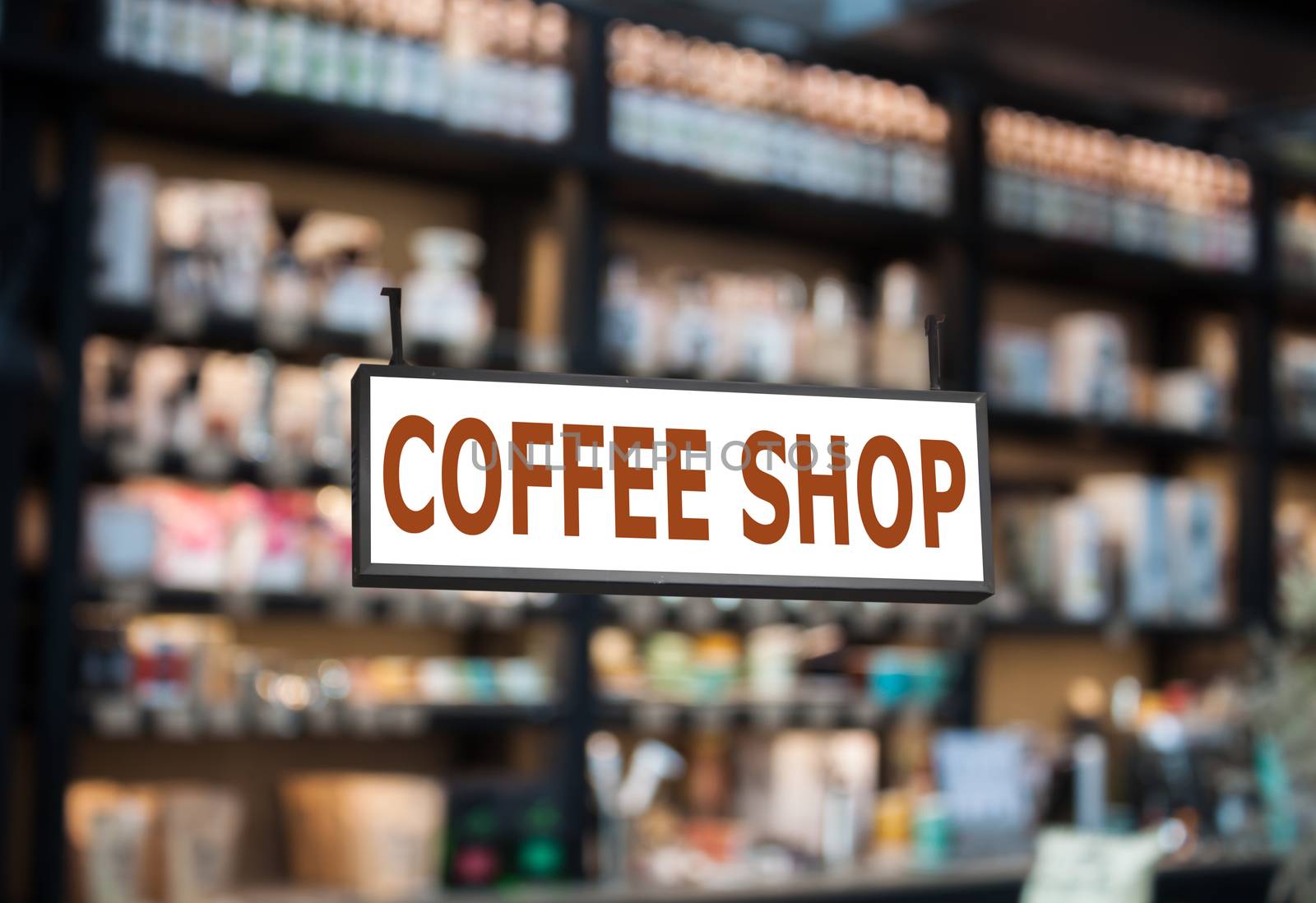 Coffee shop signboard with cafe blurred background, stock photo