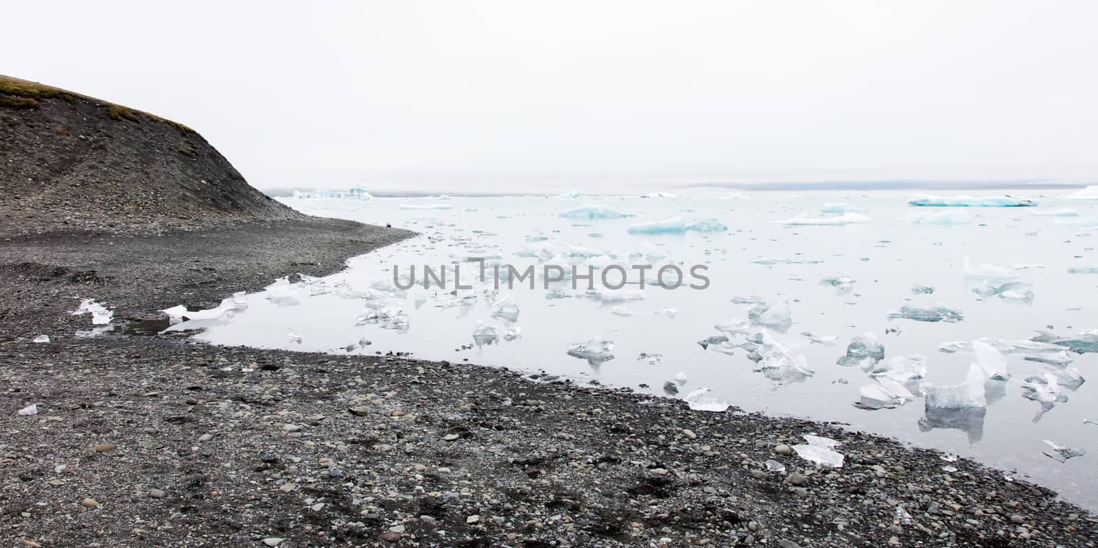 Jokulsarlon is a large glacial lake in southeast Iceland - Ice breaking of a glacier