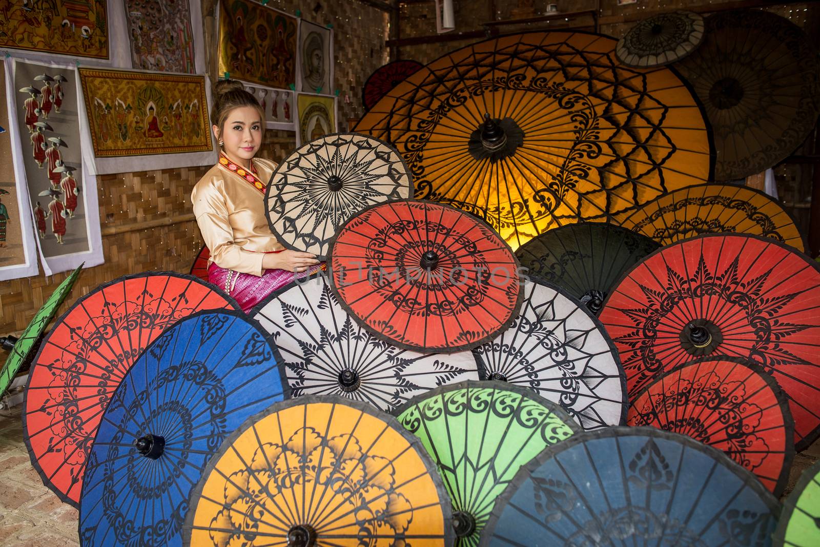 Asian Women in Colorful Umbrella Souvenier Shop at Bagan, Mandal by chanwity