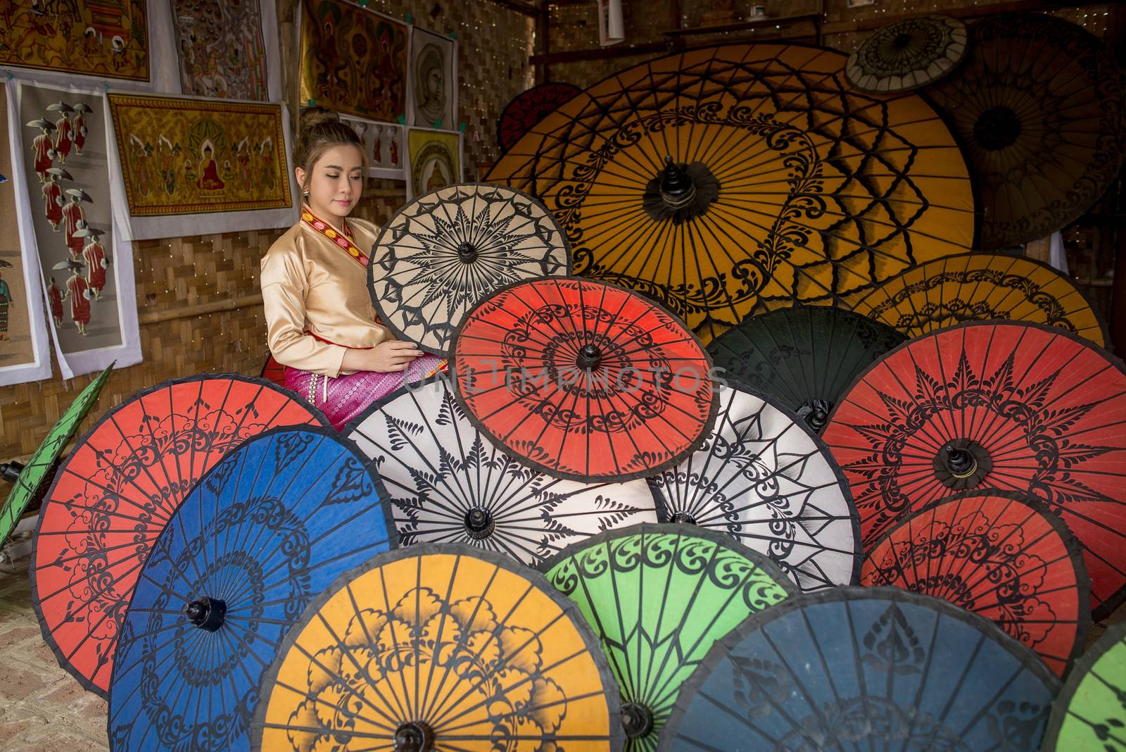 Asian Women in Colorful Umbrella Souvenier Shop at Bagan, Mandal by chanwity