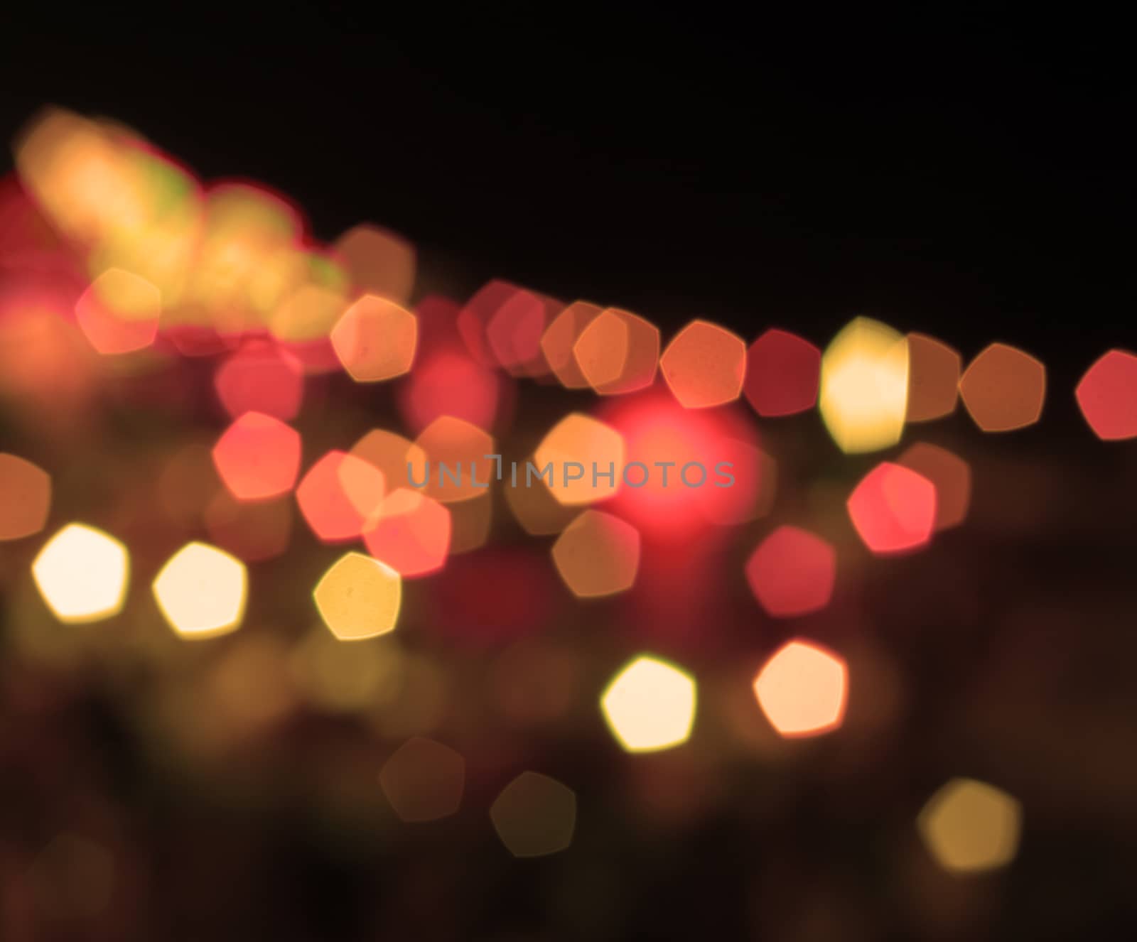Abstract blurred night lights with vintage filter by punsayaporn