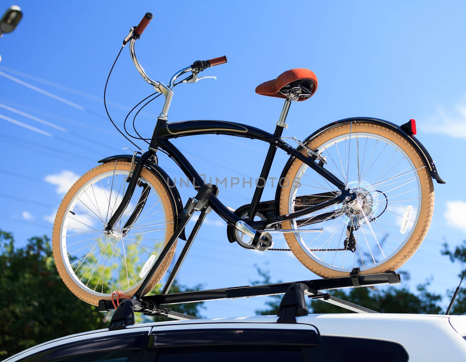 Bike transportation - bike on the roof of a car