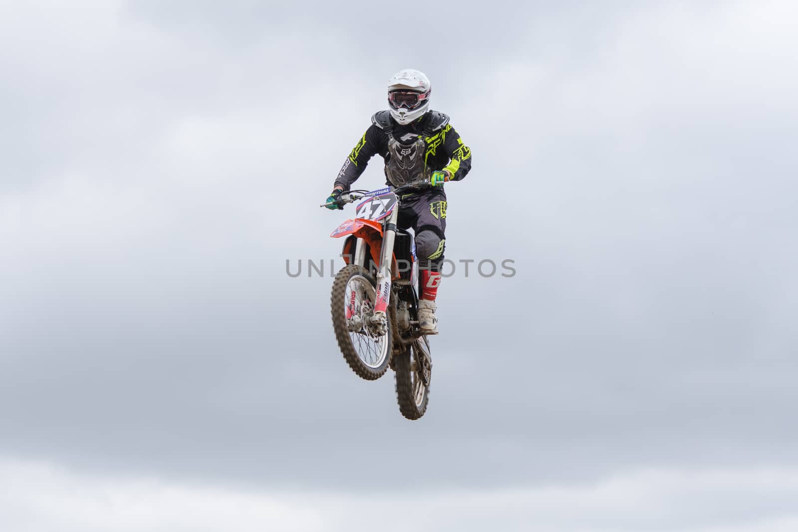 Volgograd, Russia - April 19, 2015: Motorcycle racer in flight, at the stage of the Open Championship Motorcycle Cross Country Cup Volgograd Region Governor