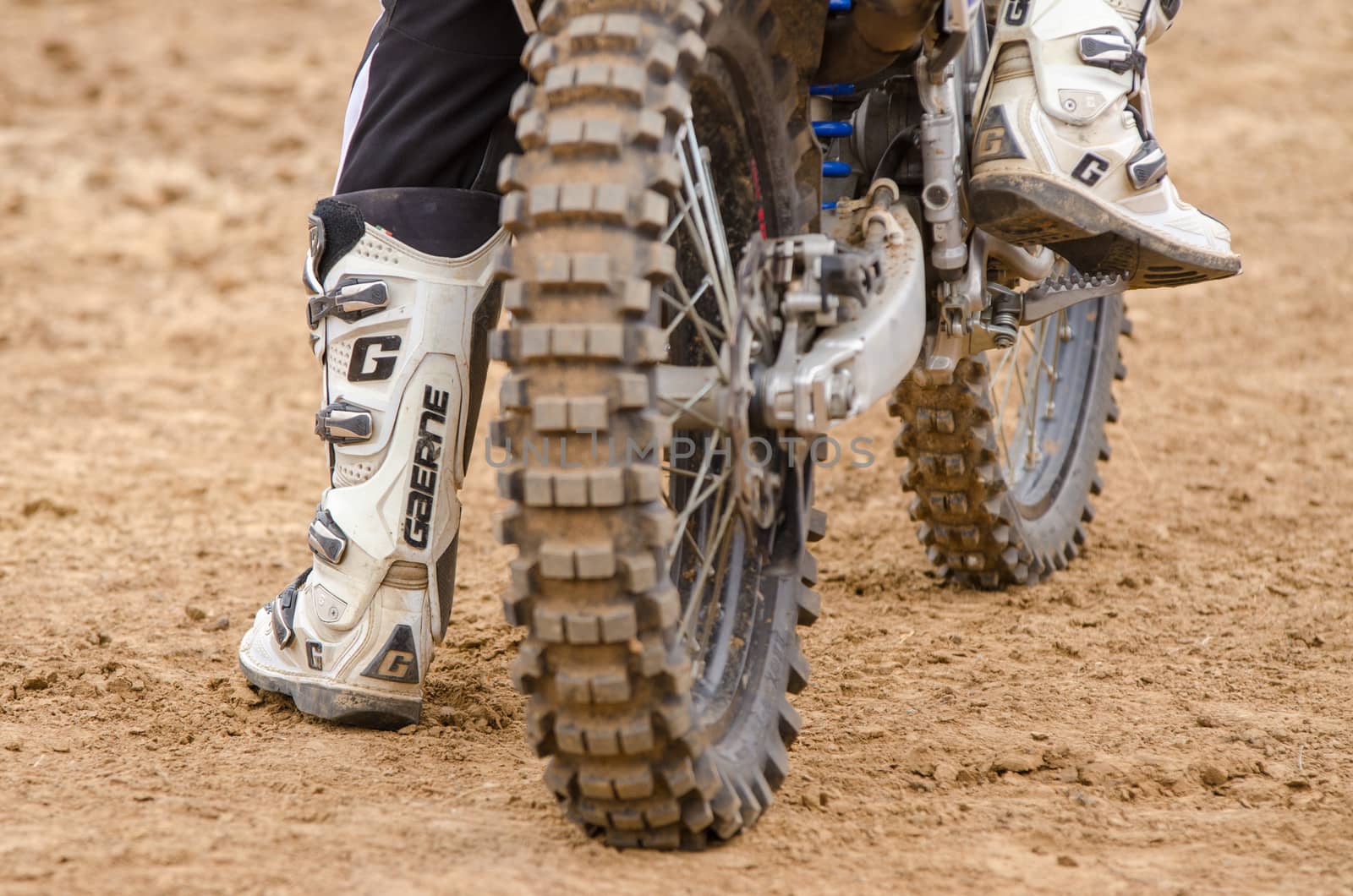 Volgograd, Russia - April 19, 2015: Rear wheel motorcycle on which sits a motorcycle racer, at the stage of the Open Championship Motorcycle Cross Country Cup Volgograd Region Governor