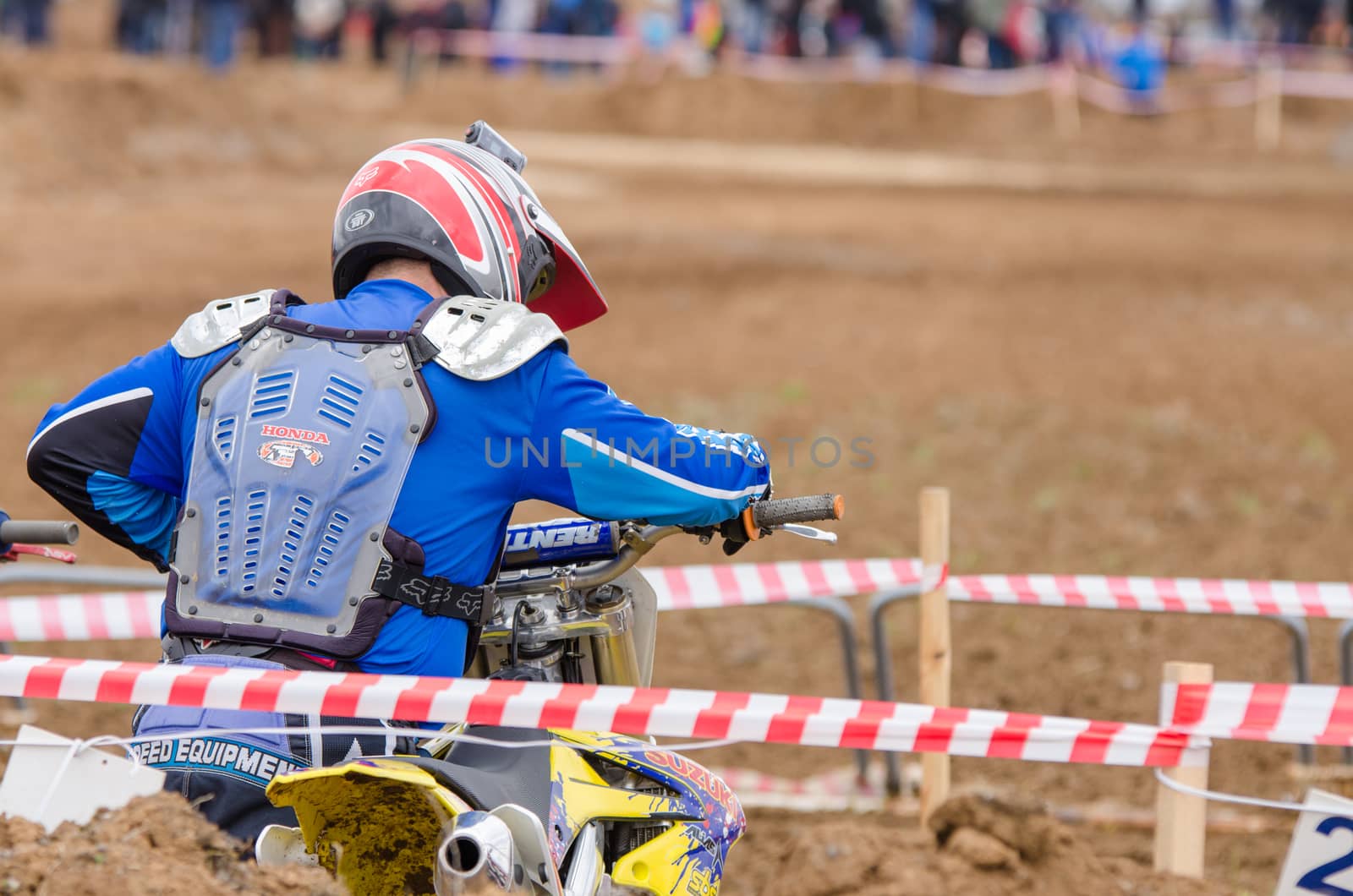 Volgograd, Russia - April 19, 2015: Motorcycle racer is ready to take the start in the race to stage the Open Championship Motorcycle Cross Country Cup Volgograd Region Governor