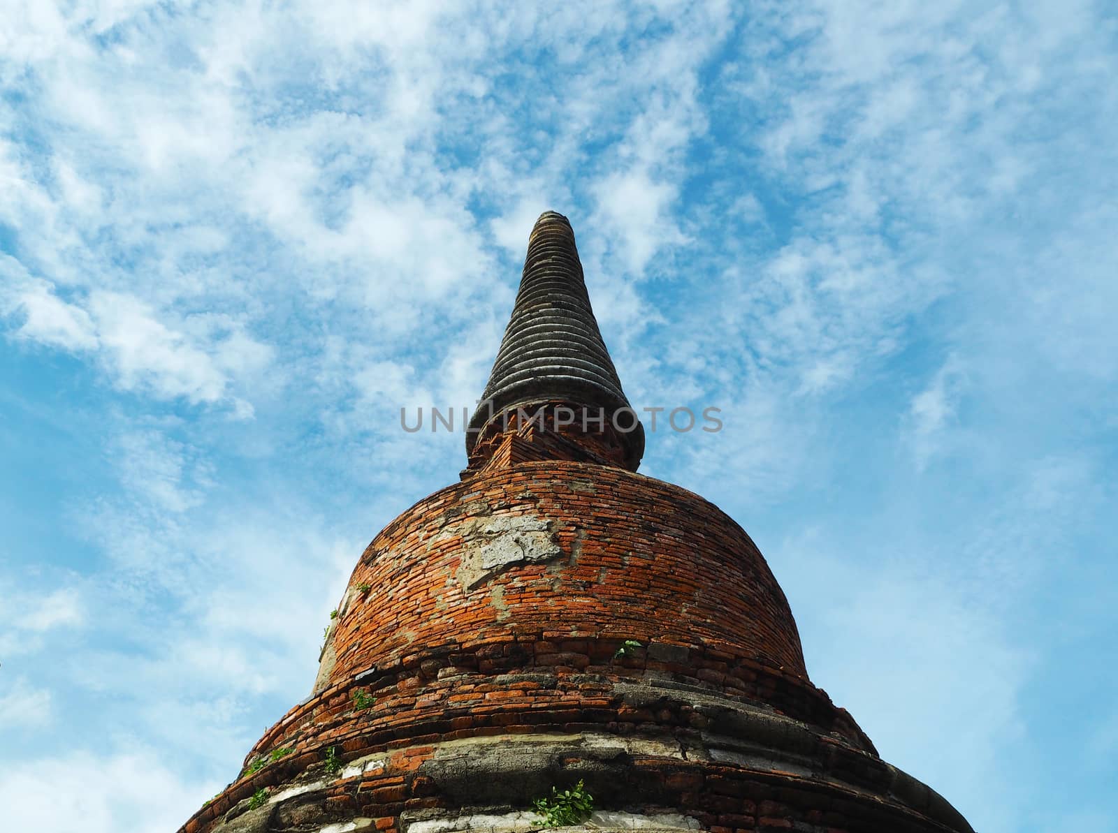 Ancient pagoda with nature background in Thailand.