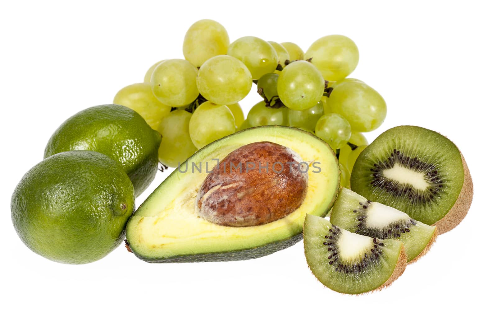 Various green  tropical fruits isolated on white background. Kiwi, lime, grape, avocado.