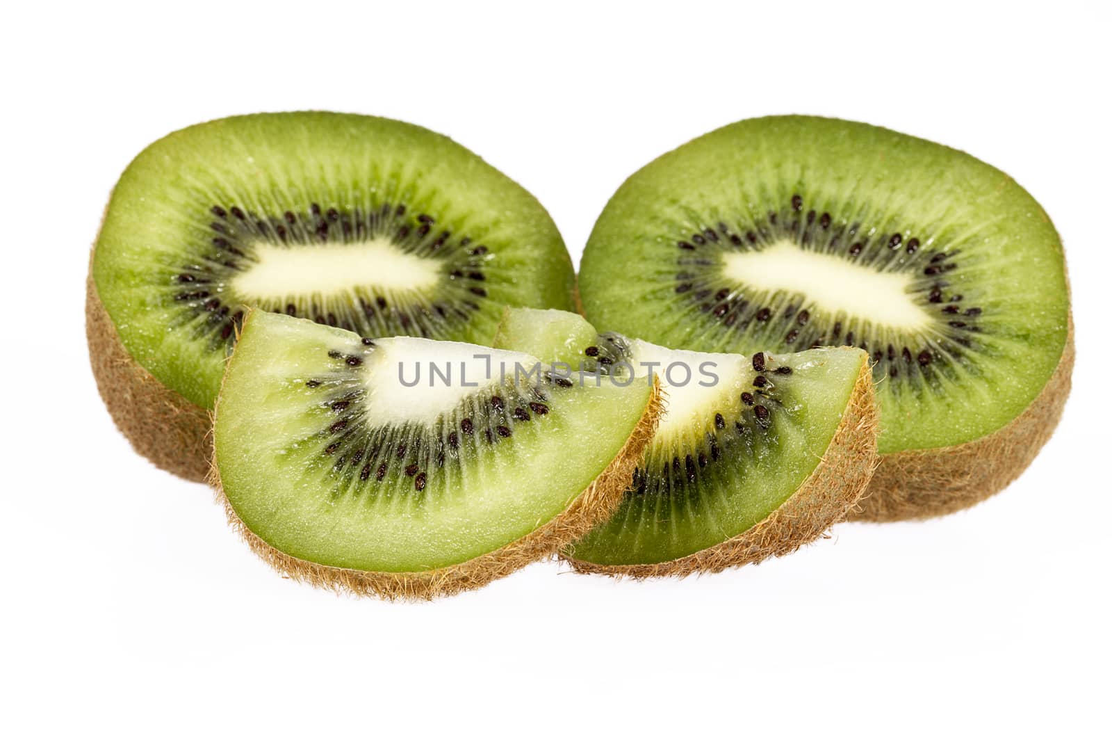 Pieces of green kiwi isolated on white background, close up by mychadre77