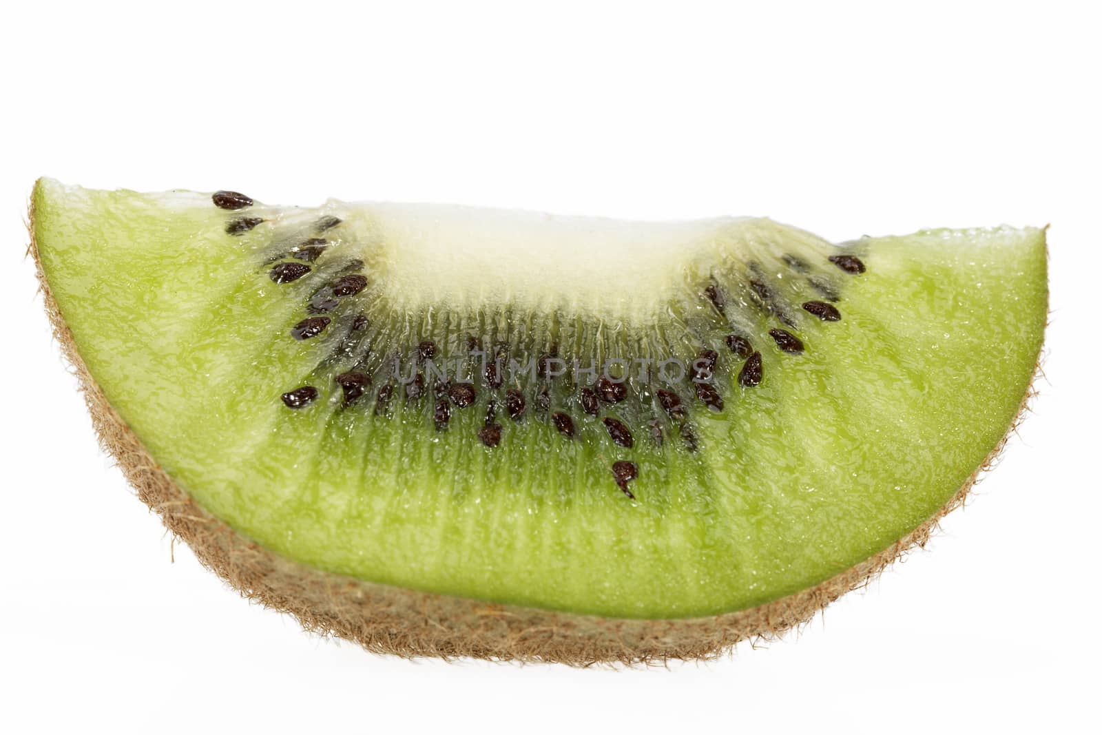 Piece of green kiwi isolated on white background, close up