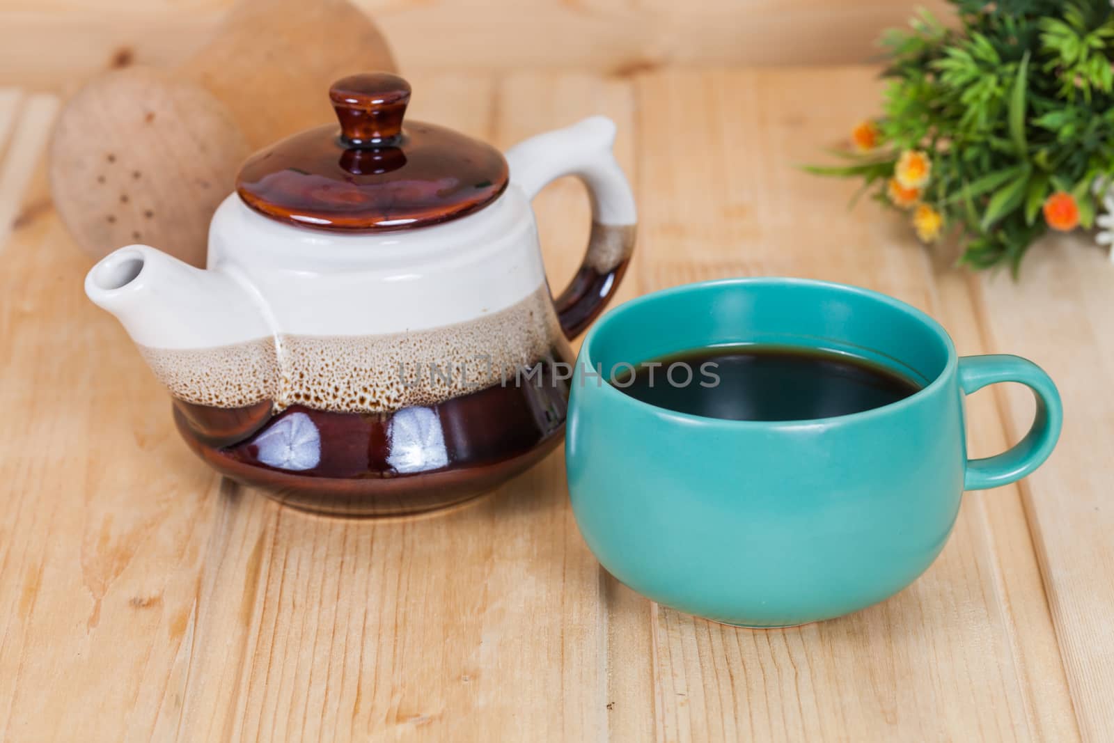 cup of coffee on  wood table