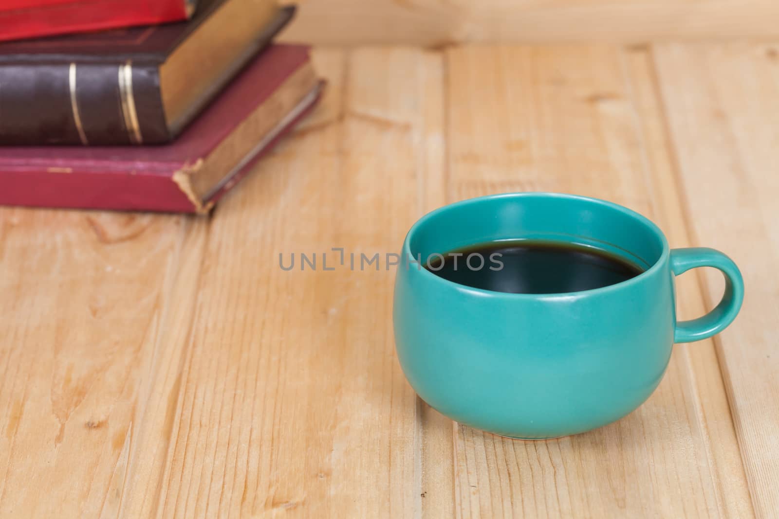 cup of coffee  on  wood table