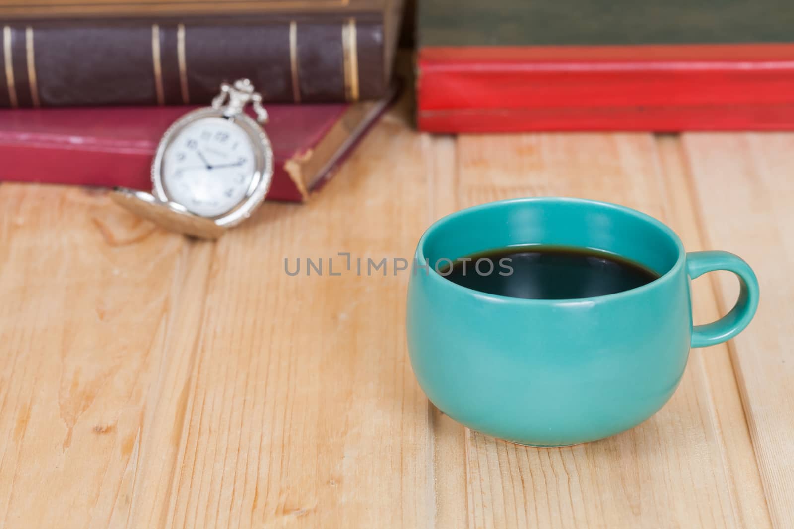 cup of coffee  on  wood table