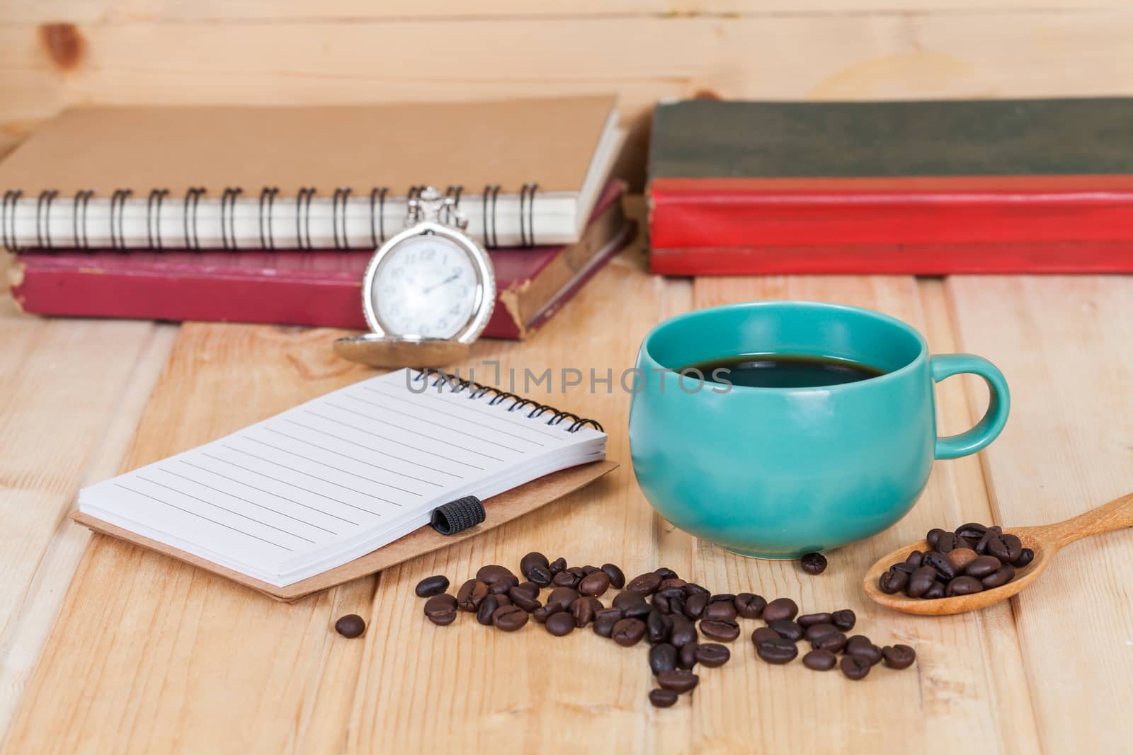 cup of coffee  on  wood table