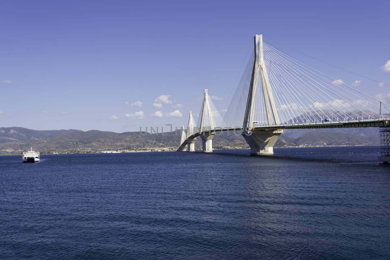 Cable-stayed suspension bridge crossing Corinth Gulf strait, Greece. It is one of the world's longest multi-span cable-stayed bridges and the longest of the fully suspended type