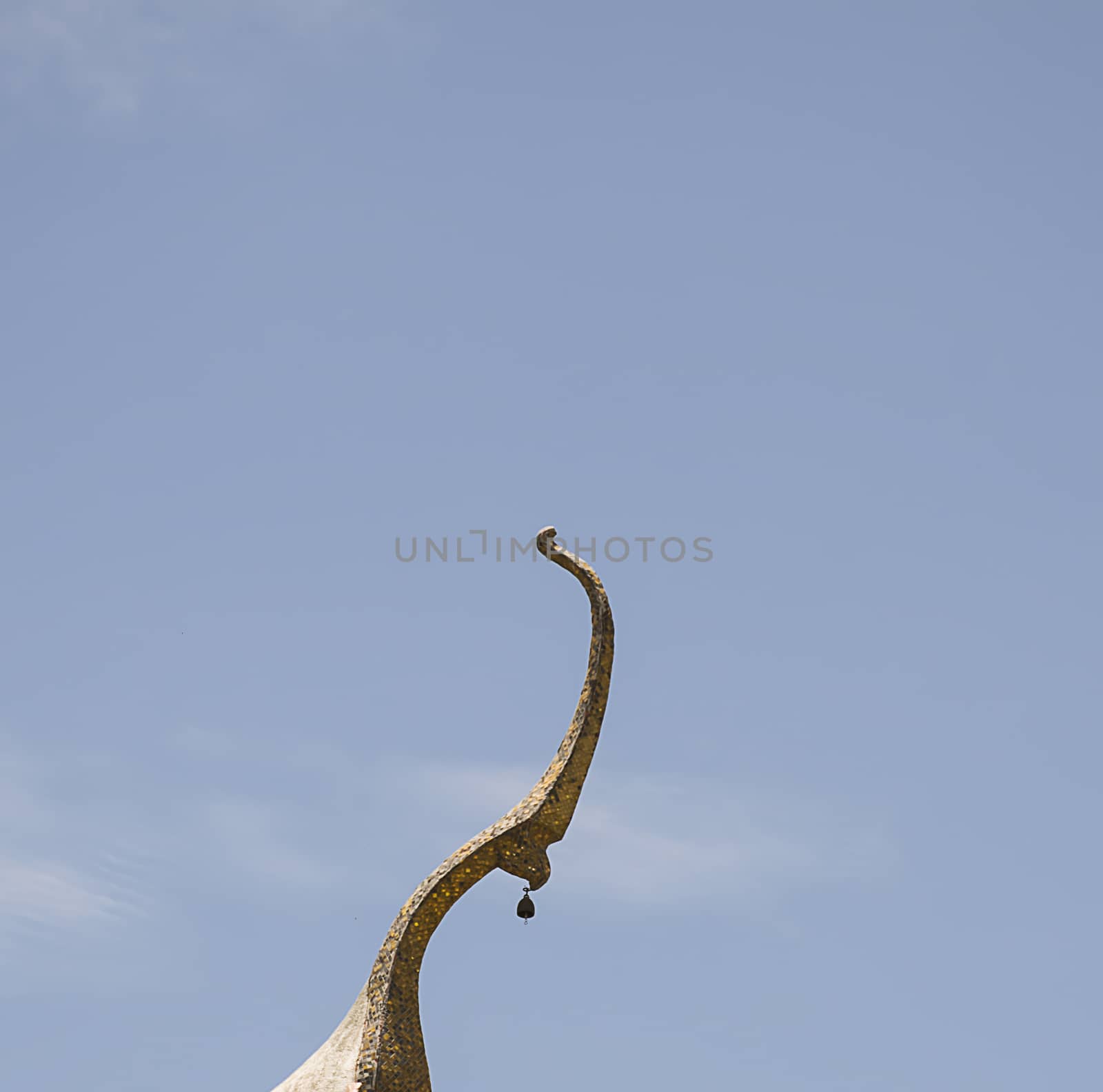 Serpent sculpture of temple roof in Thailand. ornament and detail in Thai art.